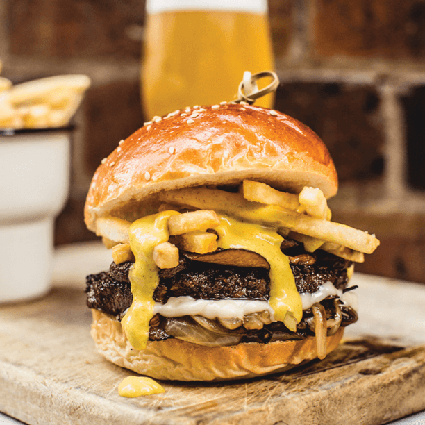 vEEF Classic Burger with loaded fries and melted cheese